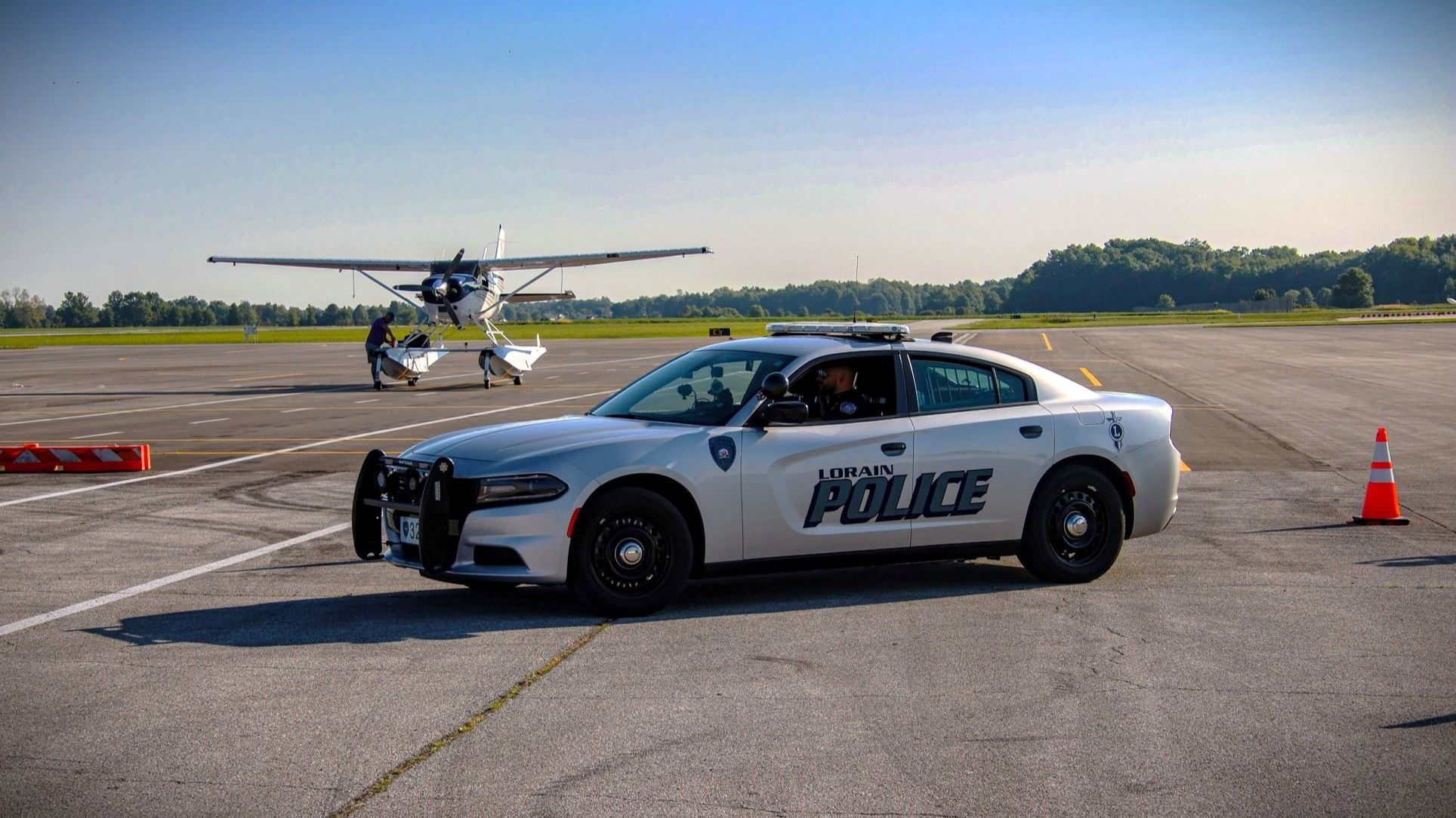 Lorain Police patrol vehicle positioned on an airport runway