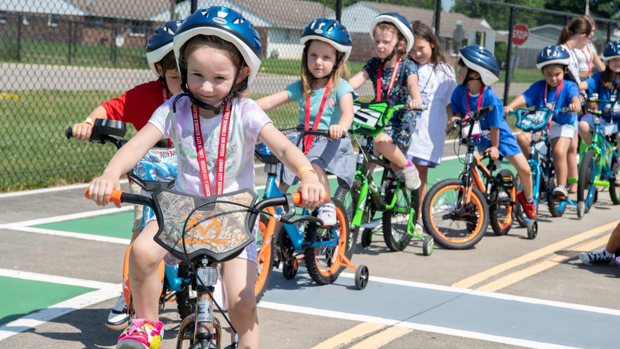 Kids biking around Safety Town